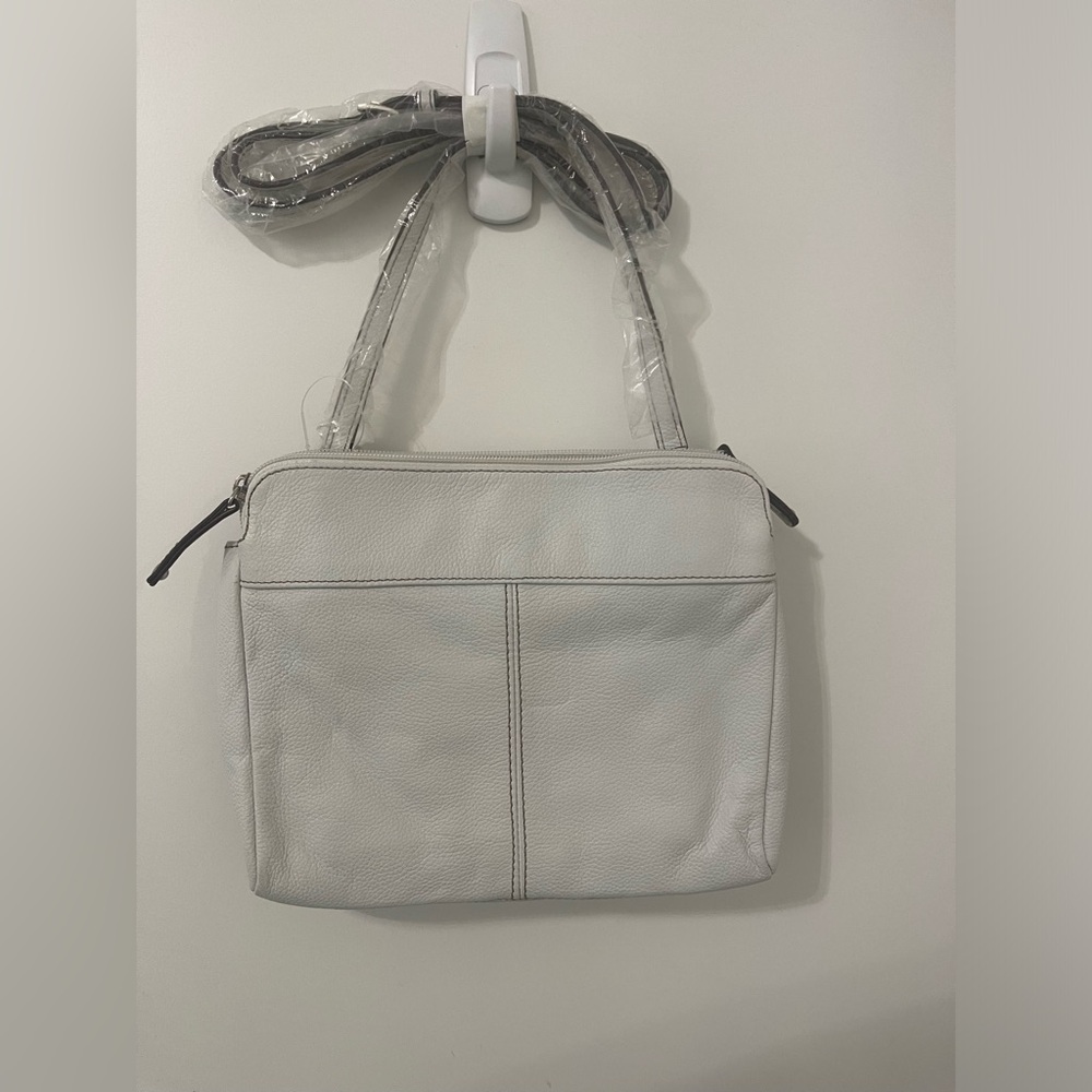White purse with various compartments